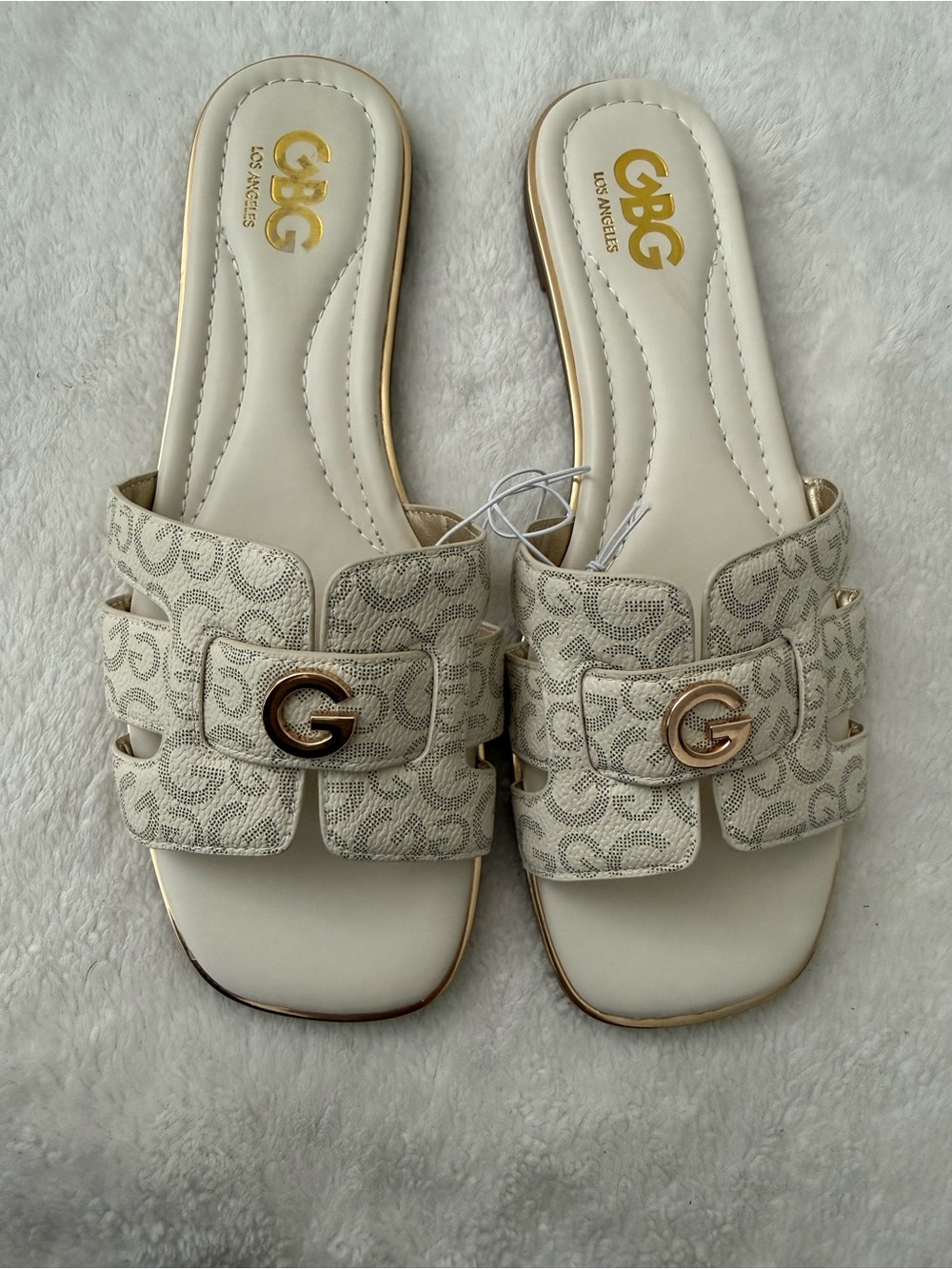 G by Guess Cream Logo-Print Slip-On Mules with Gold G Accent